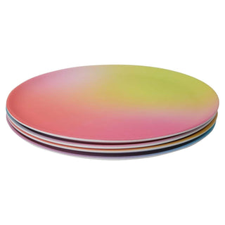 A stack of colorful Kailo Chic OMBRE MELAMINE REUSABLE PLATE SET OF 4 on a white background.
