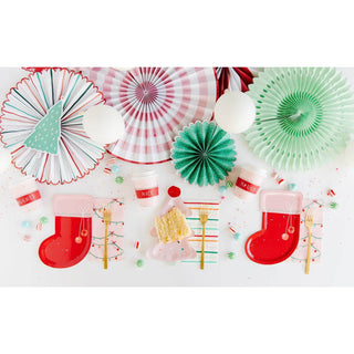 Oui Party Christmas 9" Shaped Stocking PlateThese festive 9" tall Christmas stocking-shaped plates are perfect for your neighborhood treats or cookie party. Use them to top off place settings, and pair with a My Mind’s Eye
