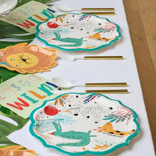 PARTY ANIMAL DINNER PLATEThese stunning paper plates will make you want to host a party at the first chance you get! These ruffled green edge plates show a fun animal design against an off-wSophistiplate