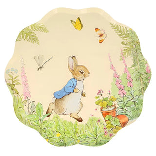 A high-quality illustrated plate featuring Peter Rabbit in a garden with butterflies and flowers: Meri Meri's Peter Rabbit In The Garden Dinner Plates.