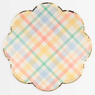 A plate with a vintage-inspired plaid design on it. 
Plaid Pattern Dinner Plates by Meri Meri.