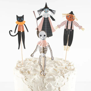 Pumpkin Patch Cake ToppersOur Pumpkin Patch cake toppers feature happy Halloween icons with charming gingham print designs and eye-catching embellishments. They will give a wonderful 3D decorMeri Meri