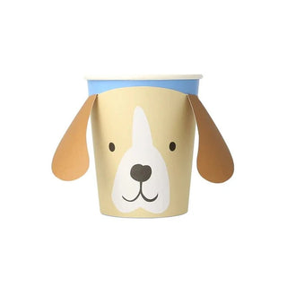 A whimsical beige Meri Meri Puppy Face with Droopy Ears cup, featuring flappy ears and a blue rim, isolated on a white background.