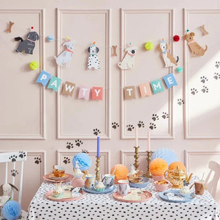 Puppy Party Garland
It's pawty time! Kids (and adults) who love puppies will simply adore this garland featuring furry friends with embellished tails and pompom hats, bones and honeycoMeri Meri