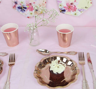 Rose Gold Paper CupsTrendy and versatile, they're a great addition to any party.  Mix and match with our rose gold plates and napkins.

Each pack contains 8 cups in shiny rose gold foilTalking Tables