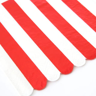 A Shiny Red Stripe Small Napkin from Meri Meri placed on a white surface for a special event.
