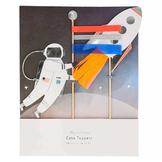 Space Cake ToppersTurn a space cake into something really sensational with this topper set. It features a spaceman holding a colorful flag, and a rocket blasting off to the skies.

ShMeri Meri