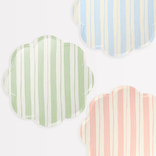Three Meri Meri Pastel Stripe Dinner Plates with scalloped edges on a white surface.