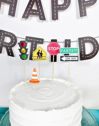 Transportation Cake ToppersHead to 'Party Boulevard' to have the best transportation party! Create fun city street scenes on your cake with these cake toppers. The set includes a stop sign, trMerrilulu