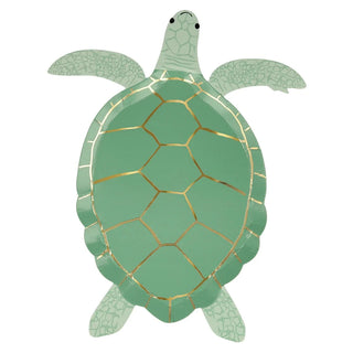 A Meri Meri green sea turtle on a white background, perfect for under-the-sea parties.