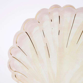 Watercolor Clam Shell PlatesThese wonderful plates will look amazing at a mermaid or under-the-sea party. They are beautifully crafted in a shell shape, with lots of shiny gold foil detail.

ThMeri Meri
