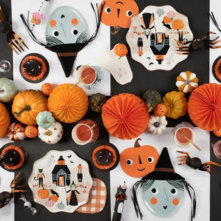 Witch PlatesAdd a delightful decorative touch to your Halloween table with these happy witch plates. She wears a hat with a shiny foil band, and has sensational 3D black raffia Meri Meri