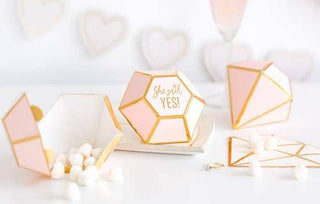 Favor BoxesIt's a fact that showers need favor gifts, so make it easy on yourself and hand out these pretty diamond boxes to your guests. Make a statement by filling them with My Mind’s Eye