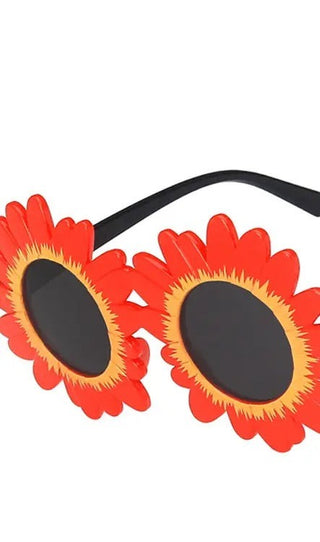 Daisy SunglassesGet your little ones ready for the sun with our Children's Daisy Sunglasses! Available in 5 vibrant colors, including blue, pink, red, white, and yellow, these styliSungo