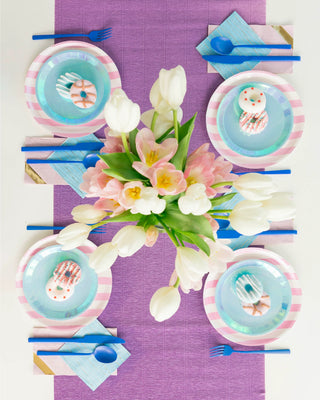 Easter table setting with Posh Bubble Mint Round Plates from Jollity & Co and tulips, enhanced with gold foil accents.