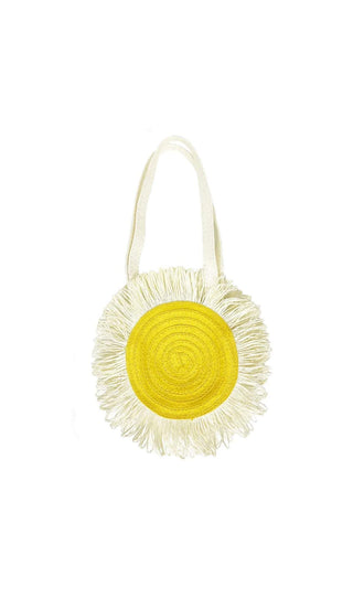 Daisy BasketThis cute basket is a fun way to carry your everyday essentials. It has a spotty yellow lining, over the shoulder handles and fastens with a magnetic dot - a summer Rockahula Kids