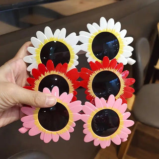 Daisy SunglassesGet your little ones ready for the sun with our Children's Daisy Sunglasses! Available in 5 vibrant colors, including blue, pink, red, white, and yellow, these styliSungo
