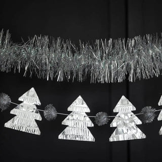 Tinsel Christmas Tree BannerShiny silver foiled trees with silver pom poms are the perfect glittering banner for your holiday decor.My Mind’s Eye